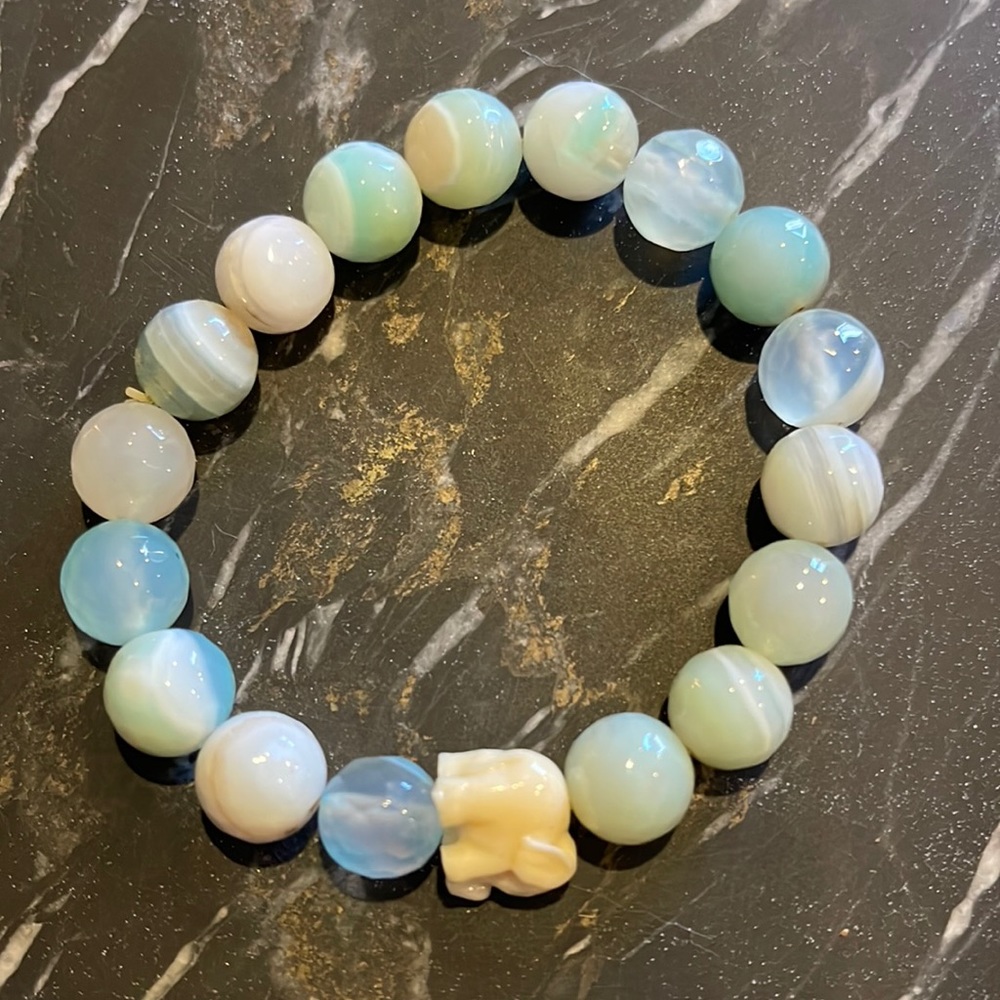 Beaded bracelet - carved shell/resin elephant